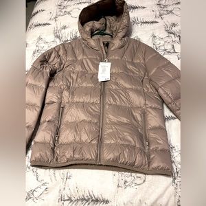 Light weight puffer jacket.  New.
